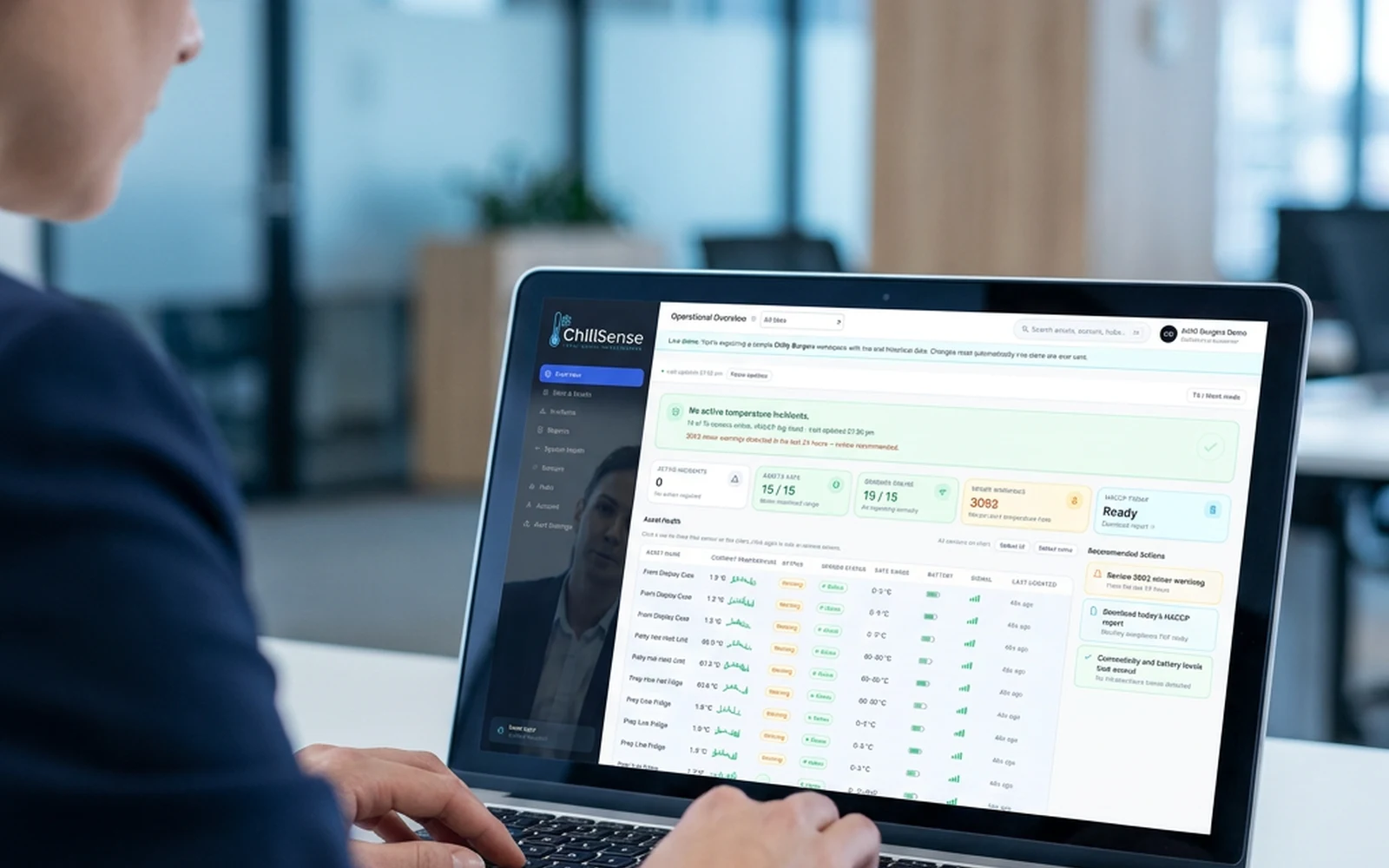 Head office operator reviewing ChillSense All sites operational overview on laptop